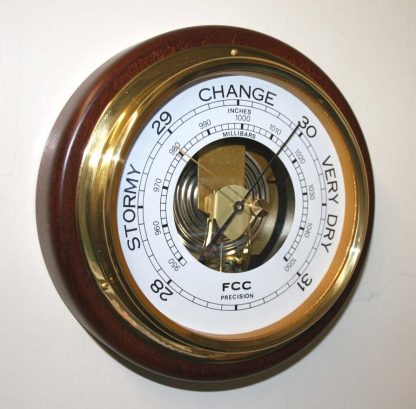 Barometer mounted on wood